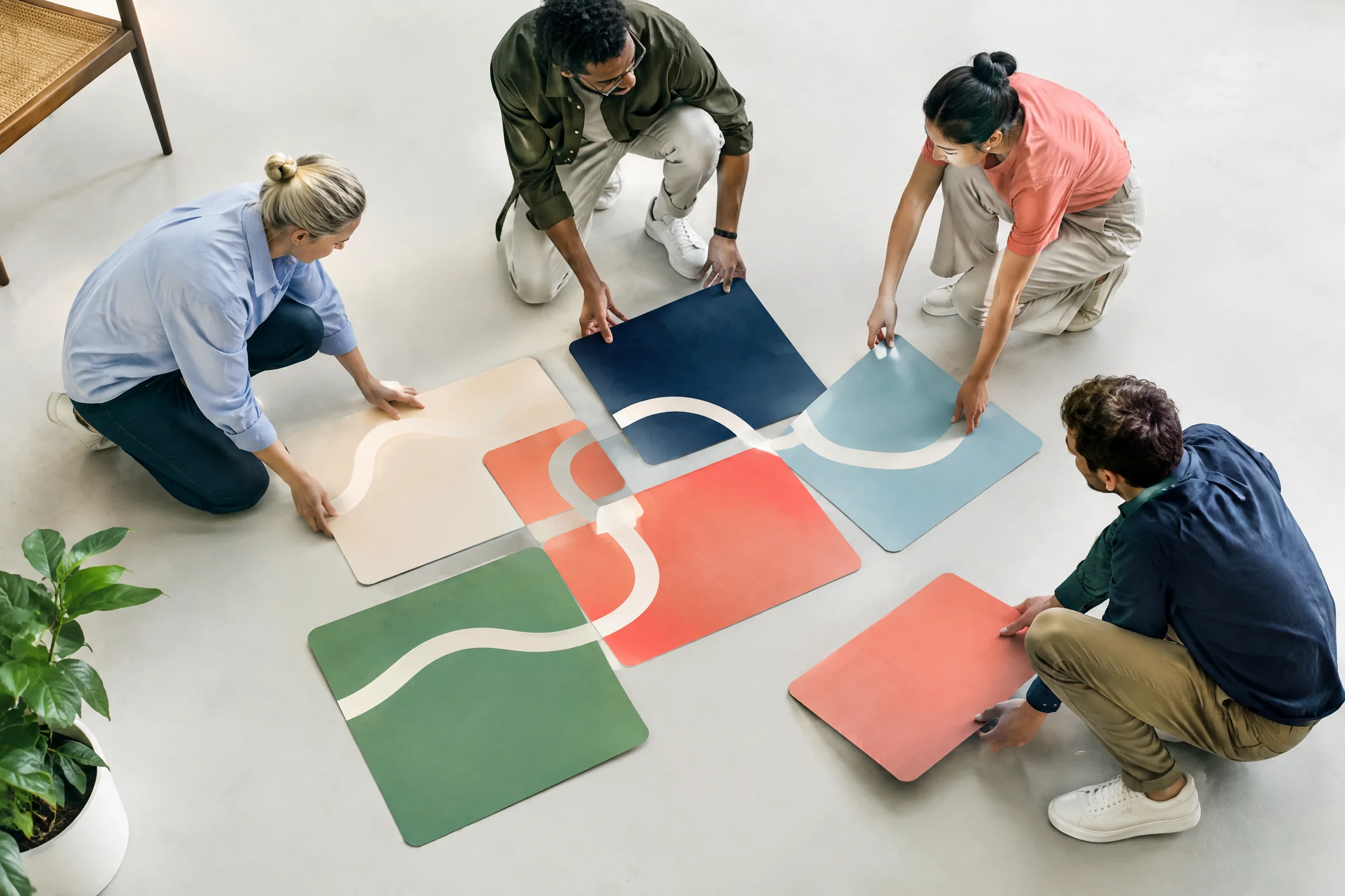 Team arranging route cards on the floor